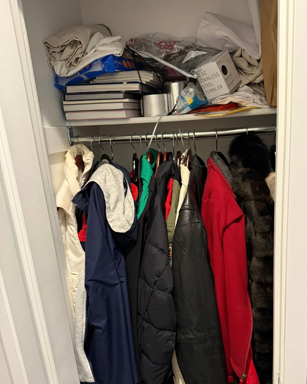 Coat closet before organizing