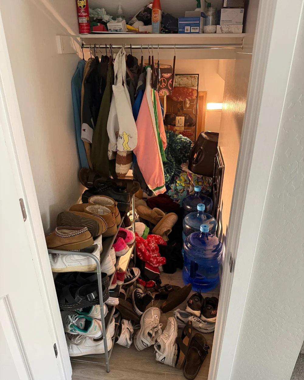Entry closet before organizing