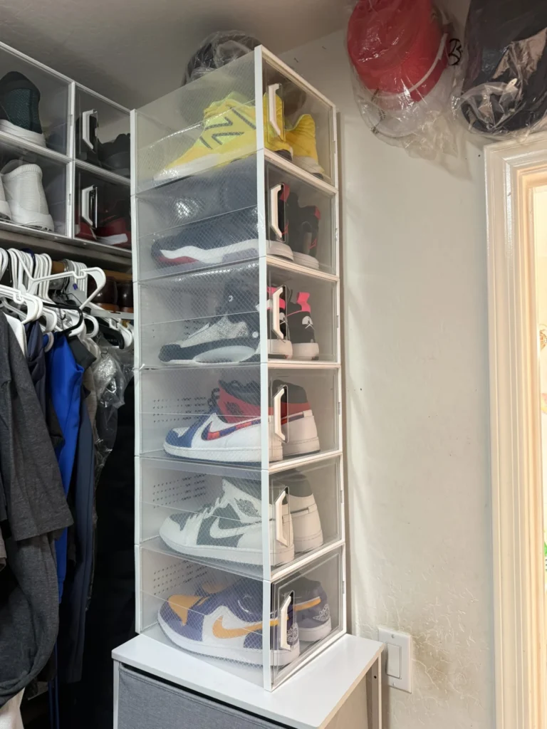 Clear shoe boxes stacked in a closet tower