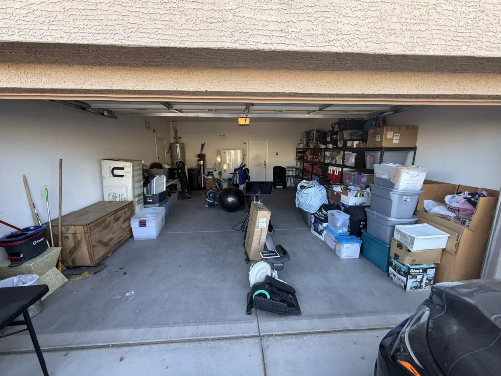 Garage after organizing, with open floor space and shelving