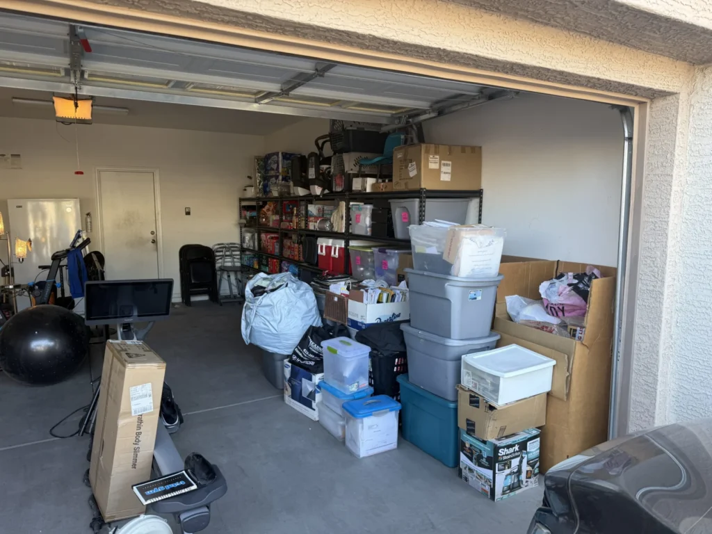 Garage after organizing, with boxes stacked along the wall