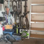 Garage wall with bikes hung on a rack